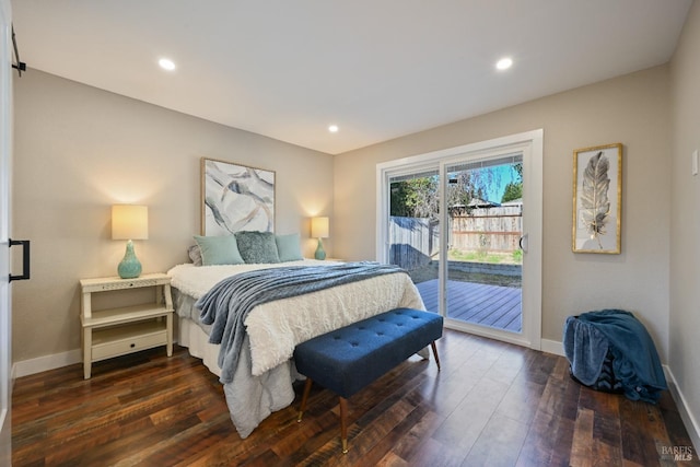 bedroom with baseboards, dark wood-type flooring, recessed lighting, and access to exterior