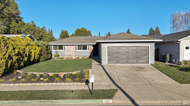 ranch-style house with driveway, an attached garage, and a front lawn