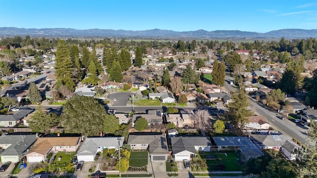 birds eye view of property featuring a residential view and a mountain view