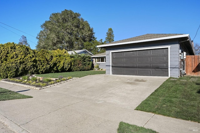 exterior space with a yard and fence