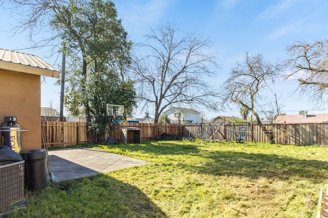 view of yard featuring a fenced backyard and a patio