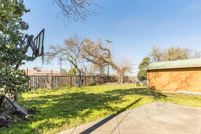 view of yard featuring a patio area and a fenced backyard