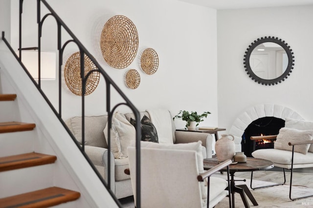 interior space with a lit fireplace