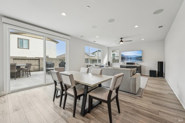 dining space with recessed lighting, baseboards, visible vents, and light wood finished floors