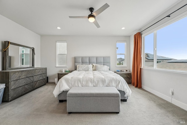 carpeted bedroom featuring recessed lighting, a ceiling fan, and baseboards