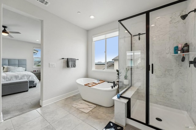 bathroom featuring a freestanding tub, visible vents, ensuite bath, and a marble finish shower