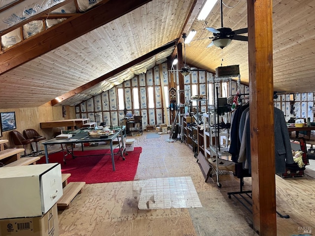 interior space with wooden ceiling, vaulted ceiling with beams, and a ceiling fan