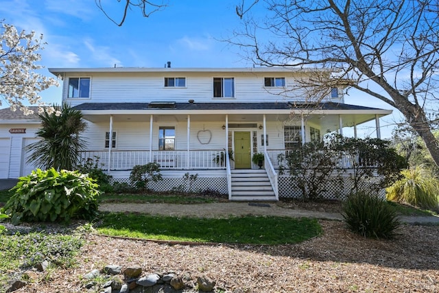 view of front of property featuring covered porch