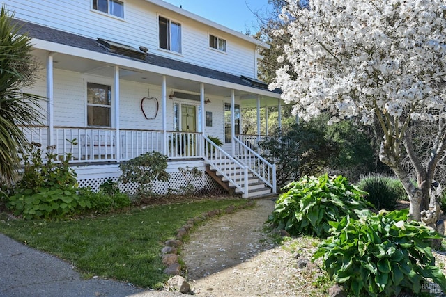 view of front of property featuring covered porch