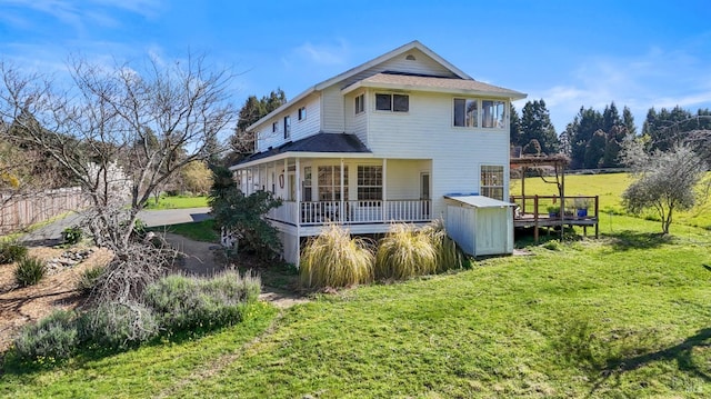 exterior space featuring a deck and a yard