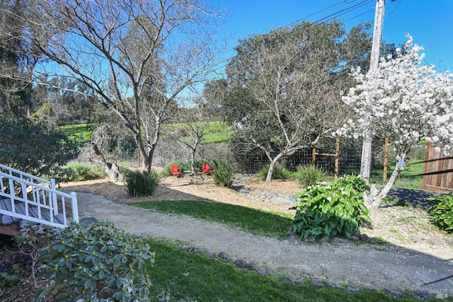 view of yard with fence