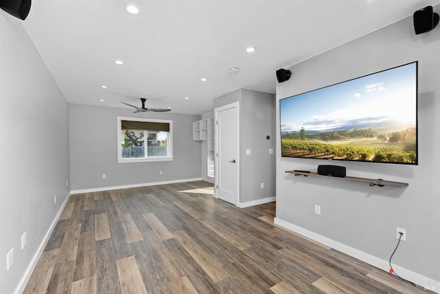 unfurnished living room featuring recessed lighting, wood finished floors, baseboards, and ceiling fan