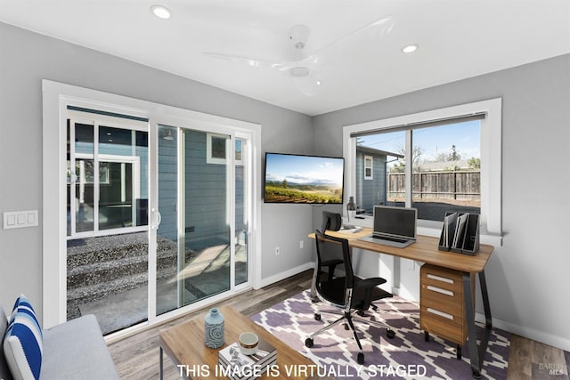 office space with recessed lighting, wood finished floors, and baseboards