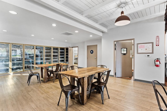 dining space featuring recessed lighting, visible vents, beamed ceiling, and light wood-style flooring