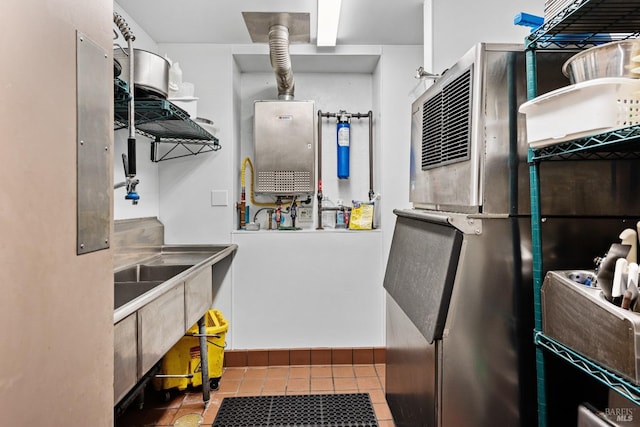 kitchen featuring open shelves and tile patterned flooring