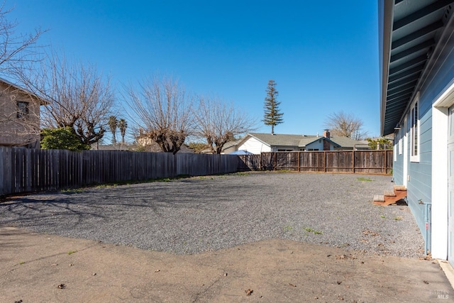 view of yard featuring a fenced backyard