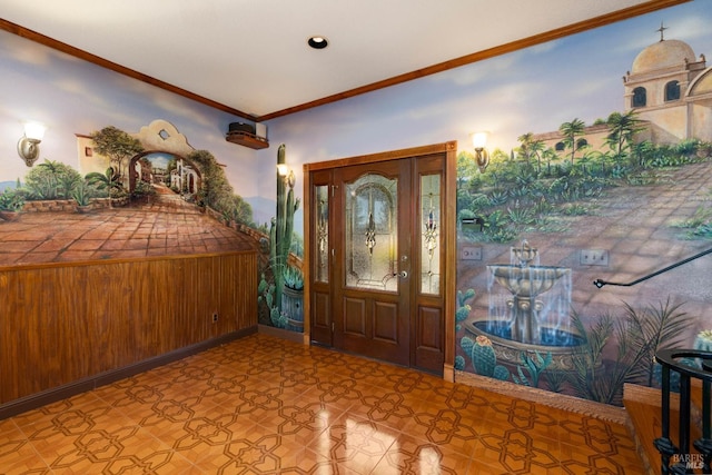 entryway with tile patterned floors and crown molding