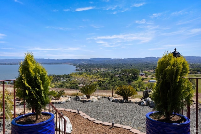 view of mountain feature featuring a water view