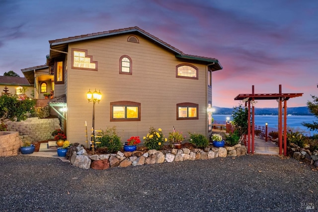 view of property exterior at dusk