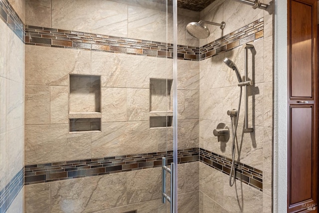 full bathroom with a stall shower