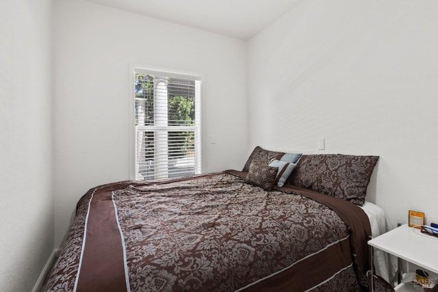 bedroom with baseboards