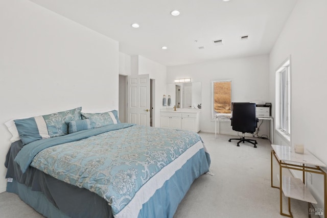 bedroom featuring light colored carpet, visible vents, and recessed lighting