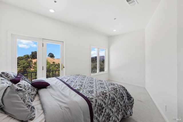 bedroom featuring visible vents, baseboards, light colored carpet, access to outside, and recessed lighting