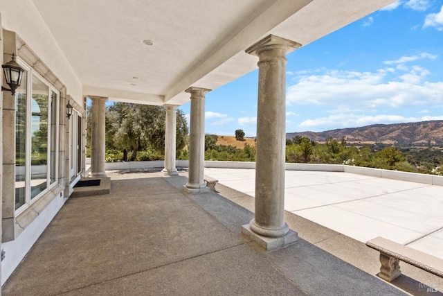 view of patio featuring a mountain view