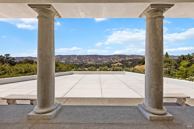 view of patio featuring a mountain view