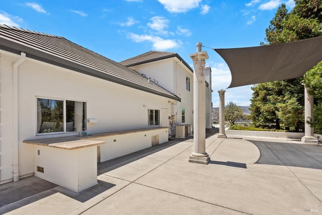 view of patio / terrace featuring visible vents