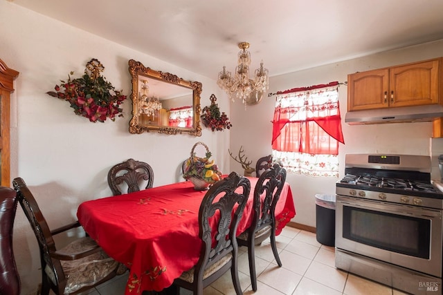 dining area with light tile patterned floors and a notable chandelier