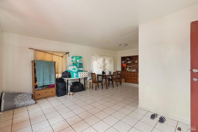 interior space featuring light tile patterned flooring