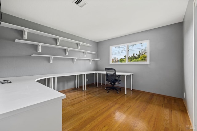 office featuring visible vents and light wood finished floors