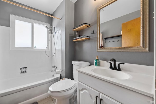 bathroom featuring toilet, tile patterned flooring, shower / washtub combination, and vanity