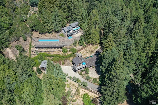 bird's eye view featuring a view of trees