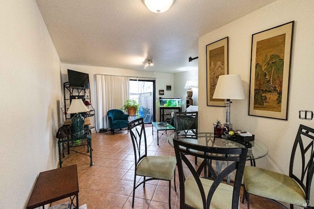 dining room featuring light tile patterned floors