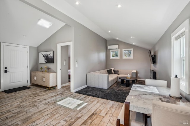 living room with wood finished floors, baseboards, a wall mounted AC, recessed lighting, and vaulted ceiling