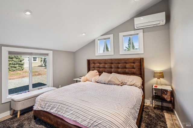 bedroom featuring recessed lighting, baseboards, lofted ceiling, and a wall unit AC