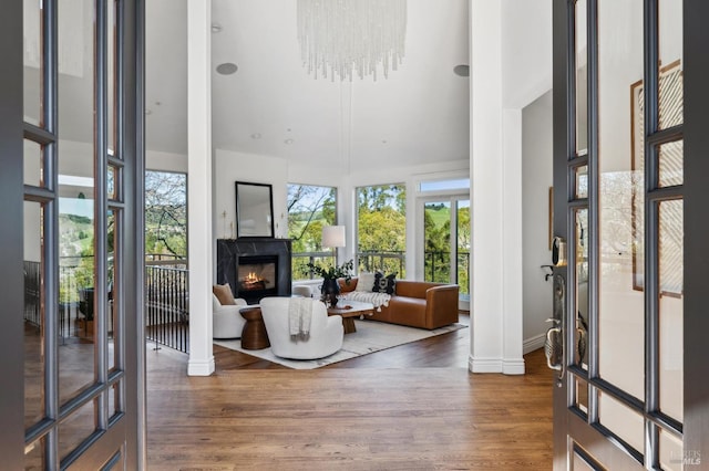 sunroom featuring a fireplace