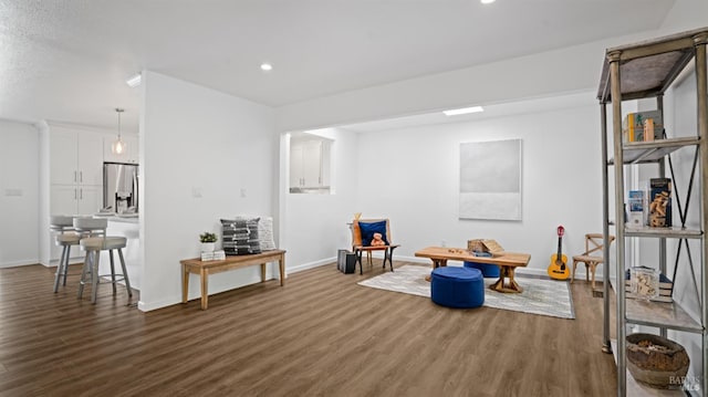 rec room with dark wood-style floors, recessed lighting, and baseboards