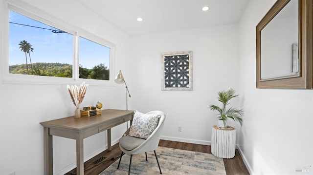 home office featuring recessed lighting, dark wood finished floors, and baseboards