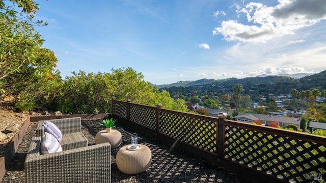 wooden terrace with a mountain view