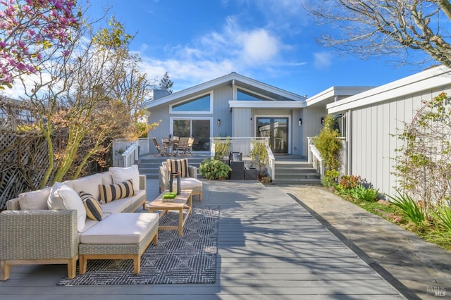 exterior space with an outdoor hangout area and a deck