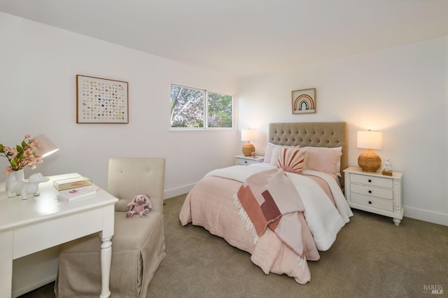 bedroom featuring carpet flooring and baseboards