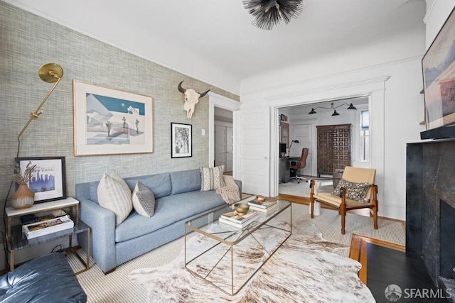 living room featuring a fireplace