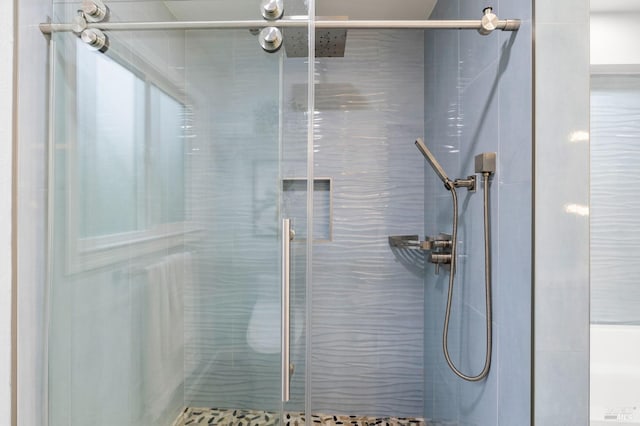 full bath featuring a stall shower