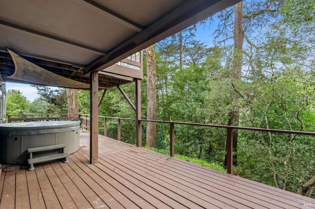 deck with a hot tub