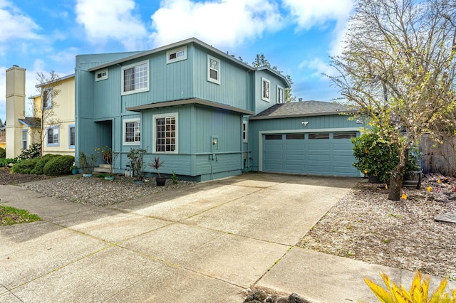 view of front facade featuring a garage and driveway