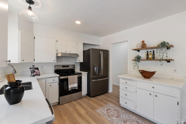 kitchen with stainless steel appliances, recessed lighting, white cabinets, light wood-type flooring, and under cabinet range hood