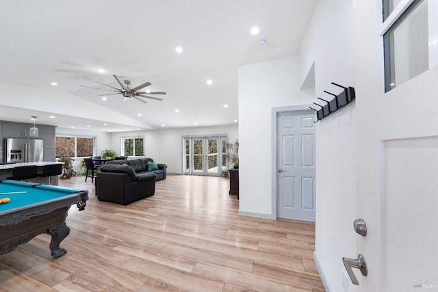 recreation room with light wood finished floors, recessed lighting, high vaulted ceiling, and pool table